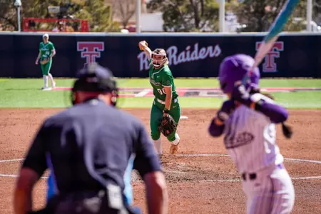 Britney Lewinski throws pitch against ACU on Feb. 27