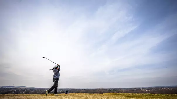 Women's Golfer tees off
