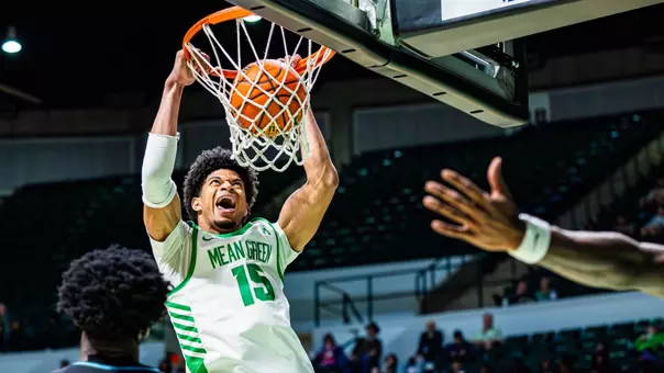 Reece Robinson dunks versus Tulane on Feb. 19, 2026