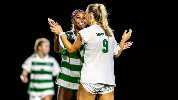 Claire Niedermeier and Mya Mitchell celebrating after goal against Nelson