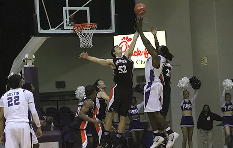 Trademark Defense Lifts Men's Basketball Over ETSU Image