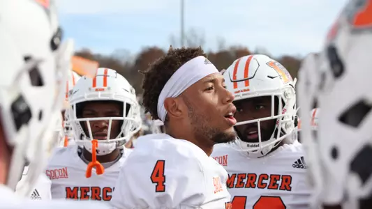 Payton talks to team