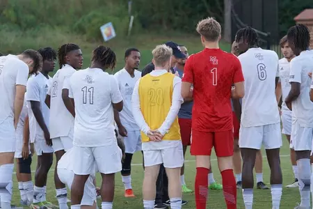 men's soccer huddle