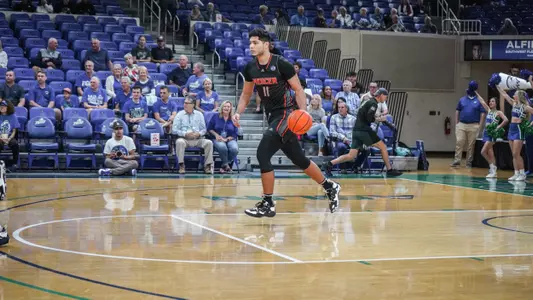 Luis Hurtado Jr. dribbling the basketball