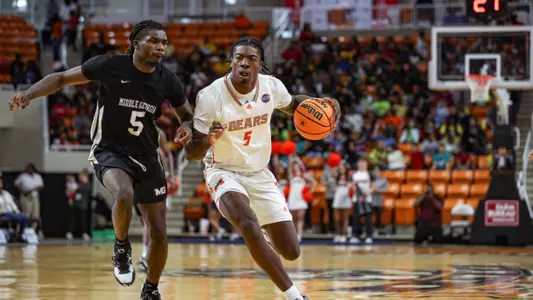 Jalyn McCreary dribbling the basketball