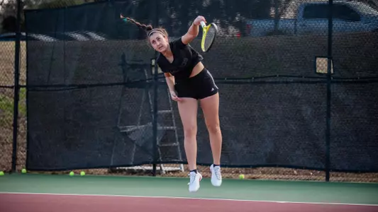 Marina de Diego Quinones on the follow through of her serve