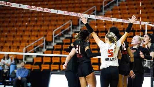 volleyball team court celebration