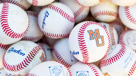 Pile of baseballs with one prominently showing the Mercer baseball logo