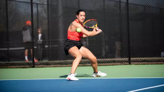 Camilla Ciaccia about to hit a backhand slice shot