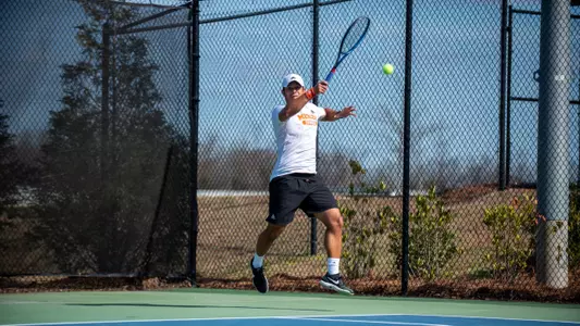 Mariano Argote in the follow through after hitting a forehand shot