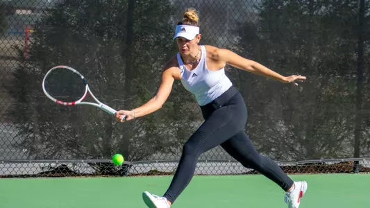 Kristin Yordanova on the move to hit a forehand shot