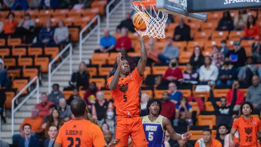 Jalyn McCreary laying the ball in to the basket