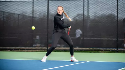Eden Schlagenhauf about to hit a backhand shot