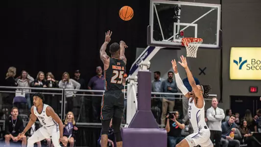 Shawn Walker Jr. shooting a three-pointer