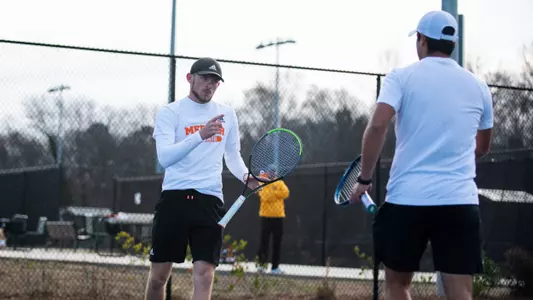 Samuel MacLeod pointing at Mariano Argote after a good point