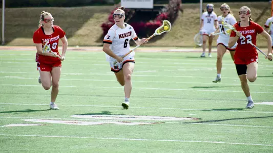 Carmella Fischer running with ball