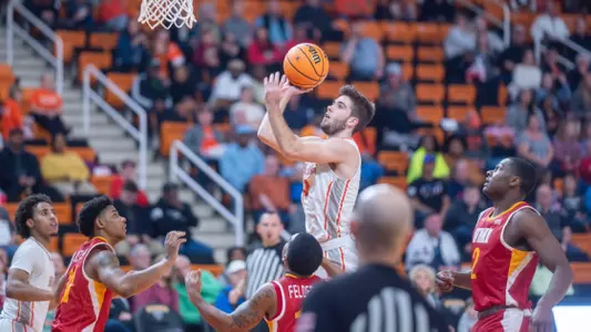 Harrison Drake jumping up to the basket