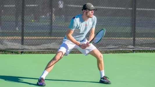 Samuel MacLeod in his ready position waiting to receive a serve