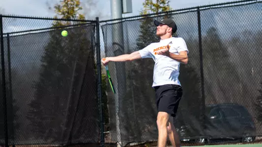 Samuel MacLeod about to hit a forehand shot