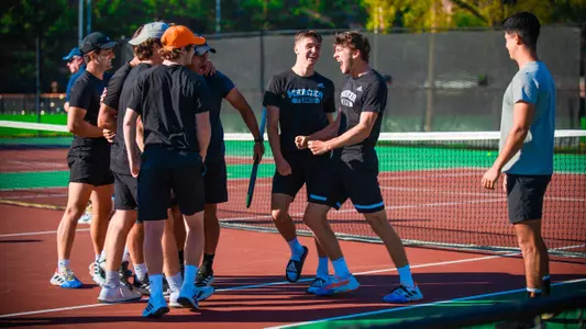 Samuel MacLeod celebrating with teammates