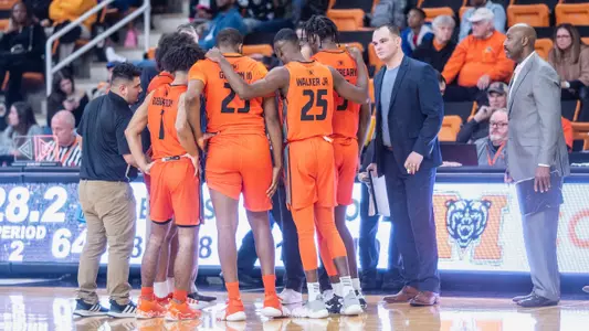 Men's basketball team huddle
