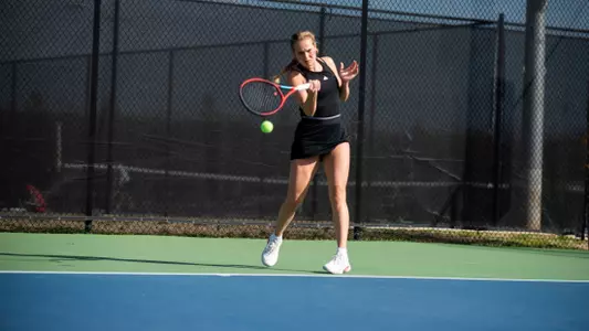 Eden Schlagenhauf hitting a forehand shot