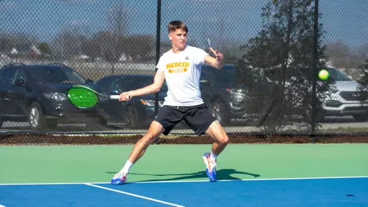 Nemanja Stefanovic sliding to hit a forehand shot