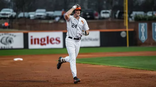 Eric Toth running around the bases after a home run