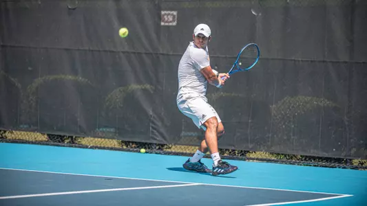 Mariano Argote about to hit a backhand shot