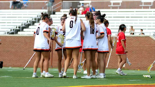 Women's lacrosse team huddle