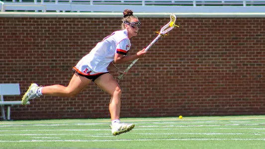 Maddi Koury running with ball