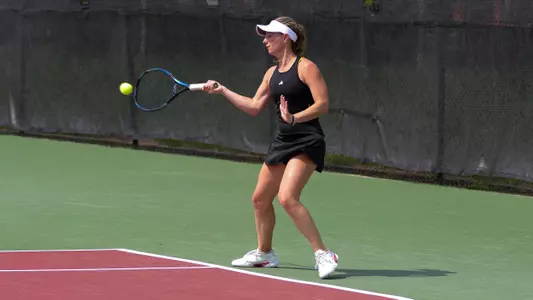 Mary Weston Courville hitting a forehand shot