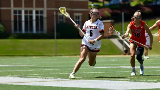 Carmella Fischer running with ball