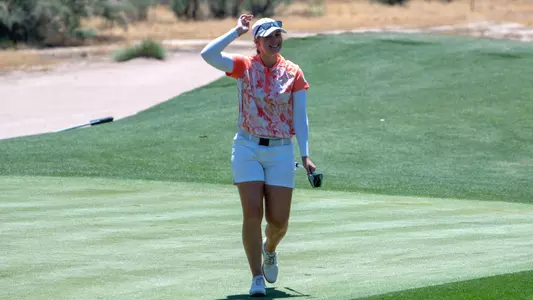 Mikayla Dubnik walking off green