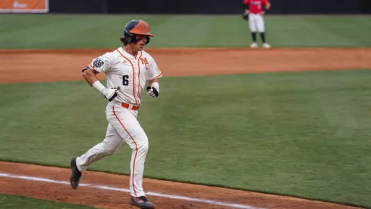 Jozsef Rohrbacher running around the base path