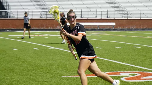 Hannah Lind looking at bench