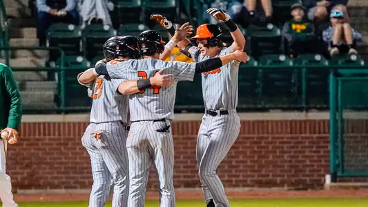 Baseball players hugging