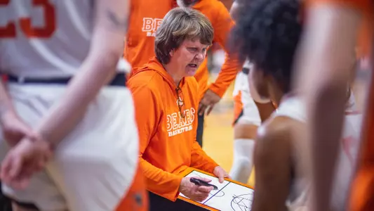 Coach Gardner in huddle