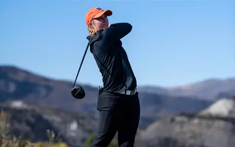 Mikayla Dubnik watching ball with driver