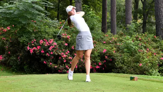 Camilla Jarvela swinging driver