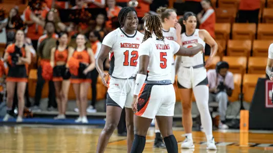 Ciante and Deja high five