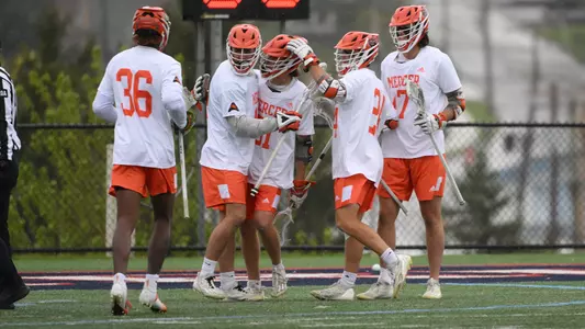 Men's Lax Celebrating a Goal