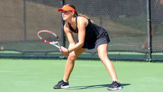 Tea Zivic looking at serve