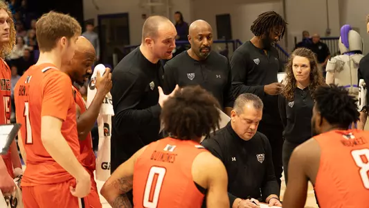 Timeout huddle at Furman