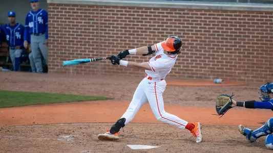 Ty Dalley hitting home run