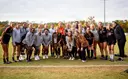 Wsoccer team picture with runner-up trophy