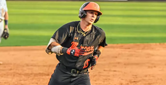 Parker Lester rounding the bases