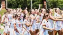 Women's lacrosse celebrating