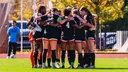 women's soccer team huddle