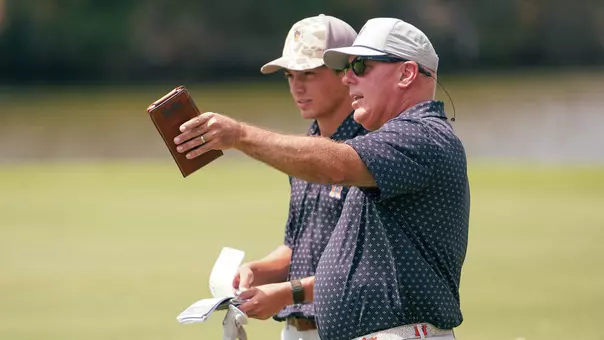 Phillips Swift and Coach Payne at Golfweek